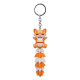 Articulated cat keychain in orange and white