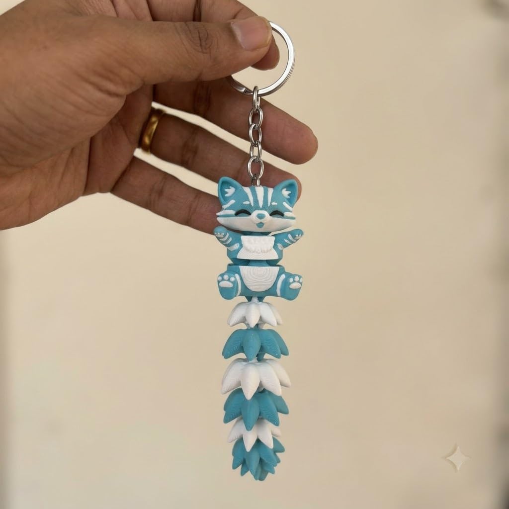 Articulated cat keychain sky blue – close-up