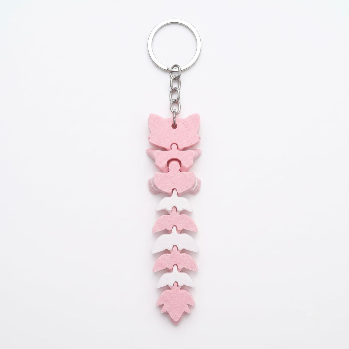 Articulated cat keychain light pink – on bag