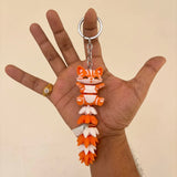 Articulated cat keychain orange – movable tail