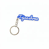 Blue and white 2-colour 3D printed name keychain reading Tejaashree