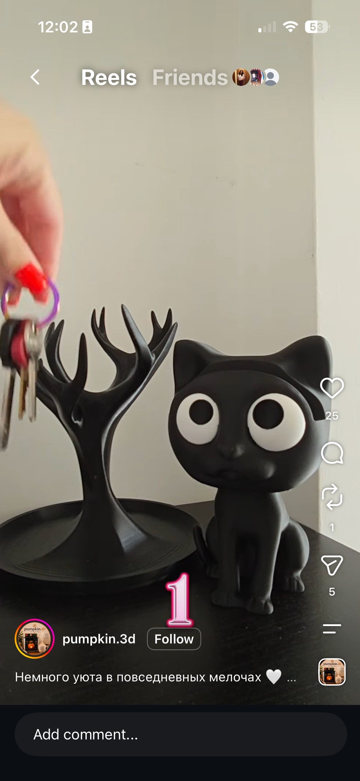 Swag Layers black 3D printed cat glasses holder sitting on a desk next to a matching black antler key organizer